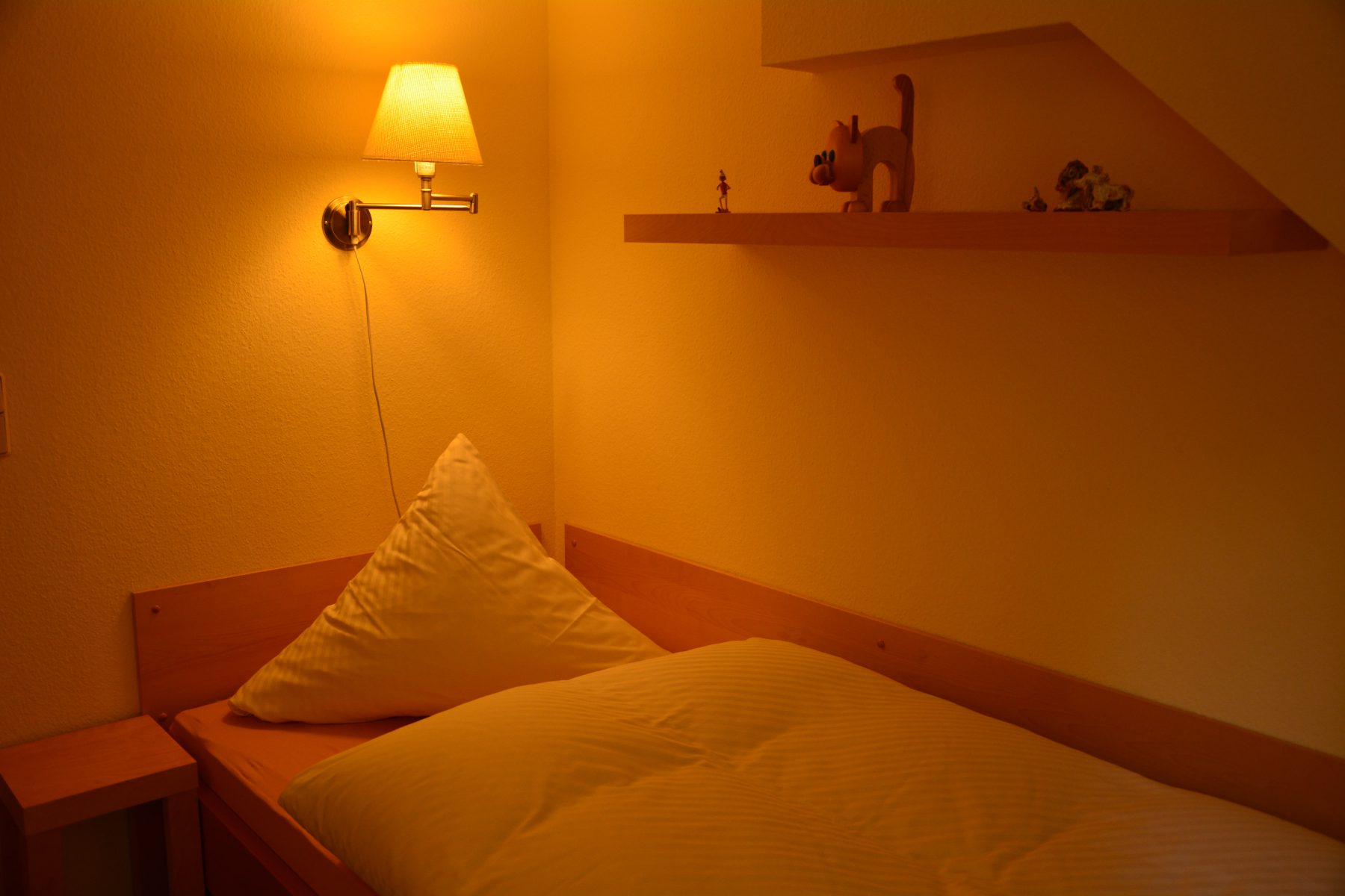 Ferienwohnung im Verlegerhaus Seiffen Kategorie N1b Detail Schlafzimmer